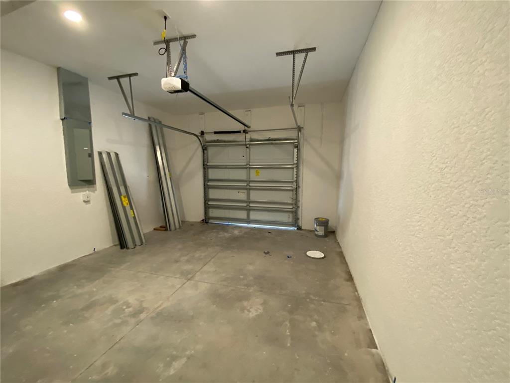 13216 Keystone Boulevard, Unit 13216 Port Charlotte, FL 33981 - Photo 13 of 23 a view of a garage
