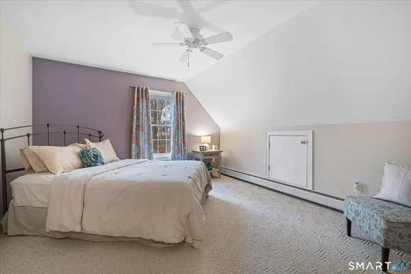 a front view of house with yard outdoor seating and barbeque oven