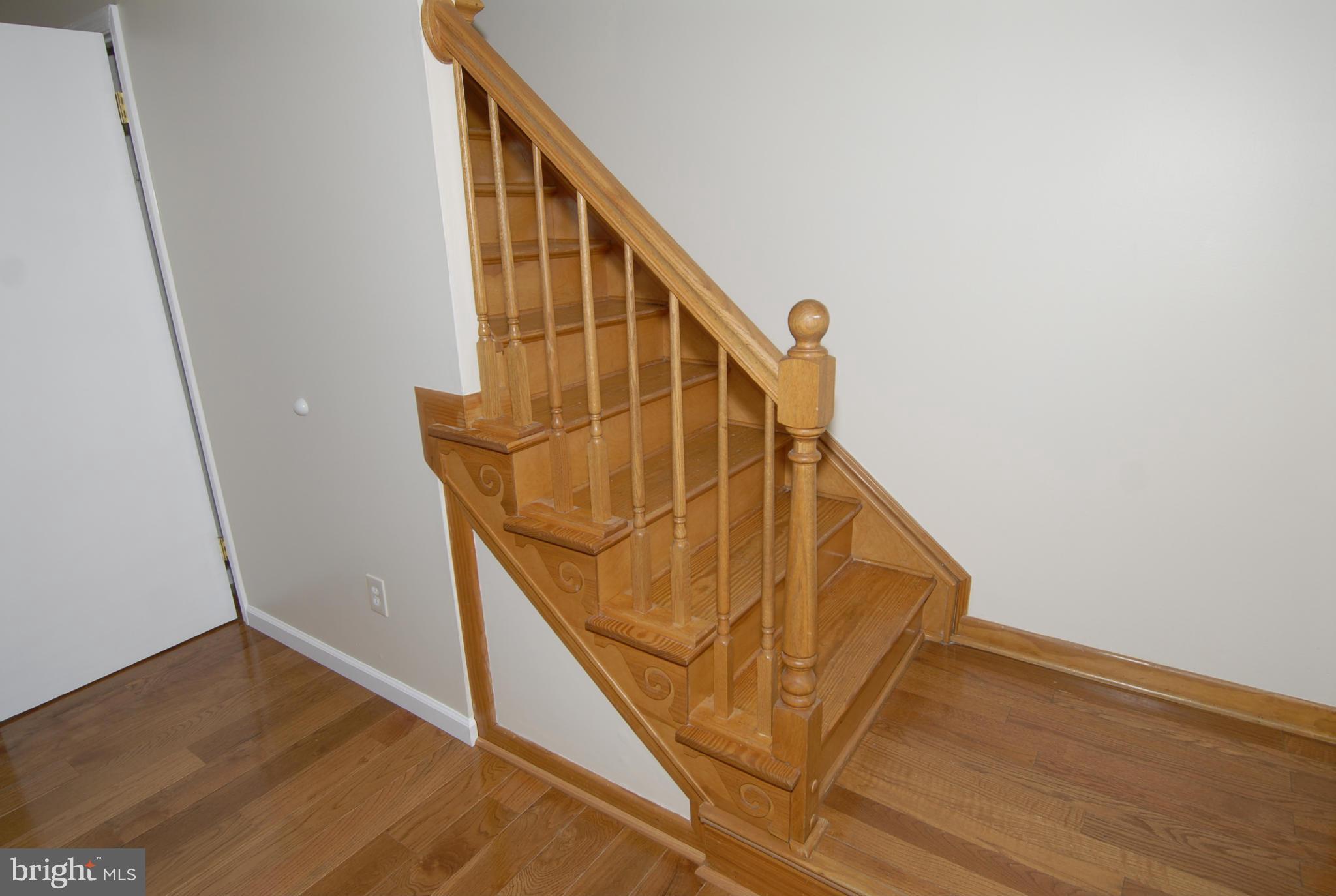 16 North Pendleton Court, Unit 10B Frederick, MD 21703 - Photo 7 of 19 Wood Stairs