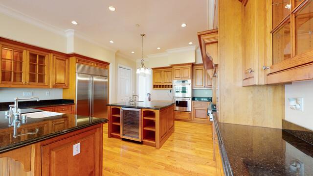 9560 Vía Del Oro Gilroy, CA 95020 - Photo 11 of 65 a kitchen with stainless steel appliances granite countertop sink stove and refrigerator