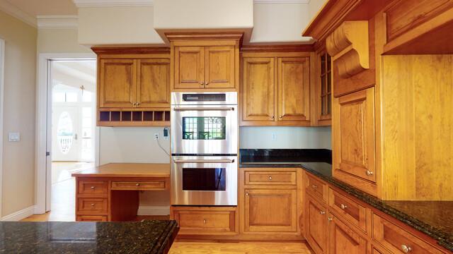 9560 Vía Del Oro Gilroy, CA 95020 - Photo 15 of 65 a kitchen with stainless steel appliances granite countertop a stove and a refrigerator