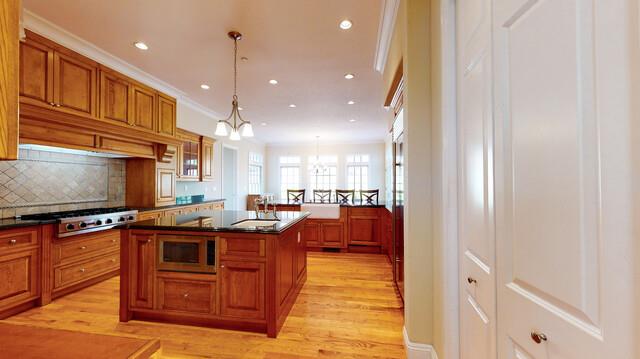 9560 Vía Del Oro Gilroy, CA 95020 - Photo 18 of 65 a kitchen with stainless steel appliances granite countertop a sink and cabinets