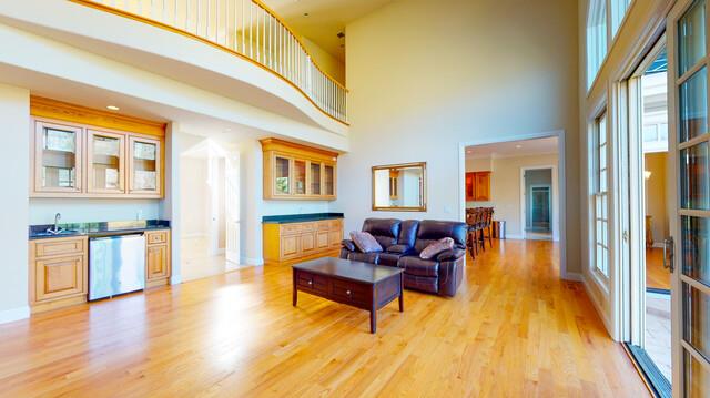 9560 Vía Del Oro Gilroy, CA 95020 - Photo 19 of 65 a living room with furniture and a wooden floor