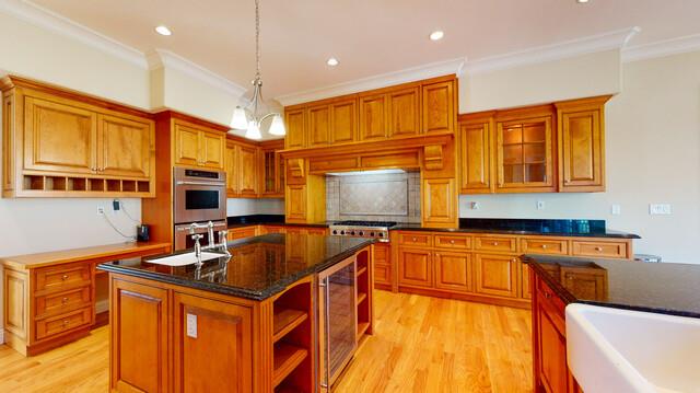 9560 Vía Del Oro Gilroy, CA 95020 - Photo 5 of 65 a kitchen with stainless steel appliances granite countertop a sink and a refrigerator