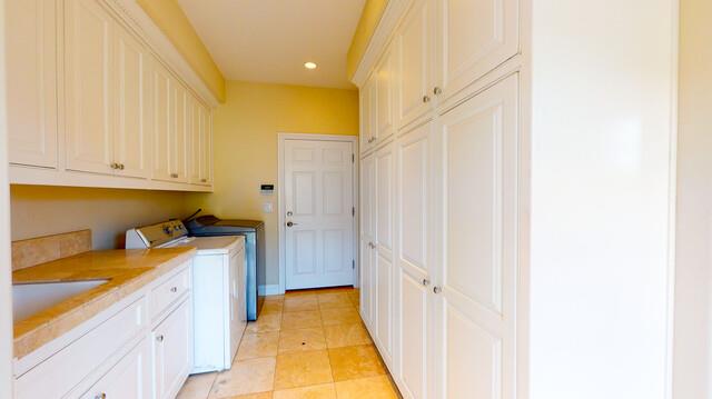 9560 Vía Del Oro Gilroy, CA 95020 - Photo 48 of 65 a view of a kitchen with white cabinets
