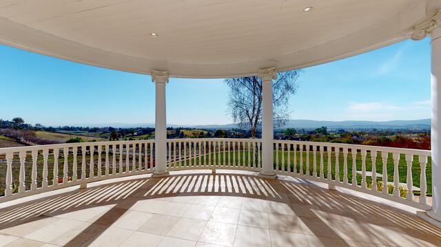 9560 Vía Del Oro Gilroy, CA 95020 - Photo 7 of 65 a view of a balcony with wooden floor