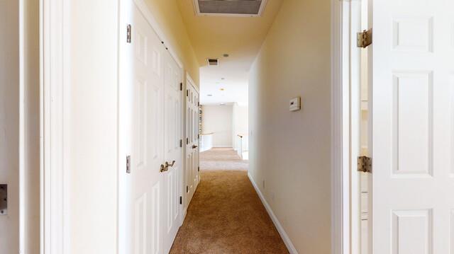 9560 Vía Del Oro Gilroy, CA 95020 - Photo 62 of 65 a view of a hallway with wooden floor and staircase