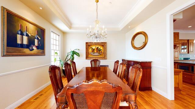 9560 Vía Del Oro Gilroy, CA 95020 - Photo 9 of 65 a view of a dining room with furniture and chandelier