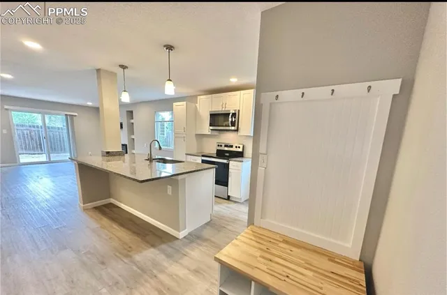 a view of a livingroom with a fireplace