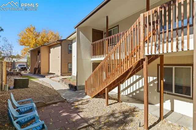 a front view of a house with stairs