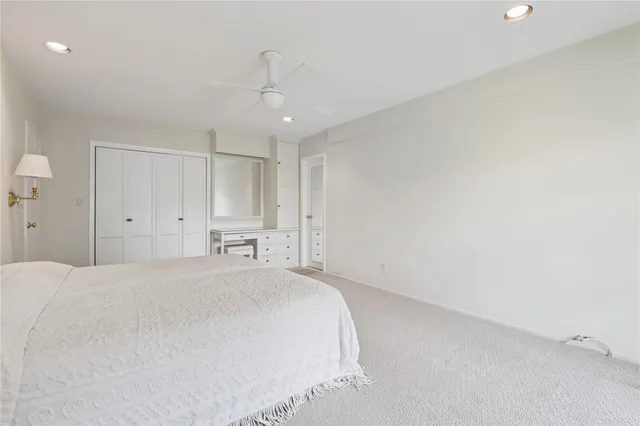 a view of a room that has a large window