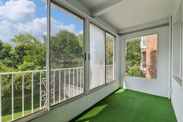 a view of staircase with a rug