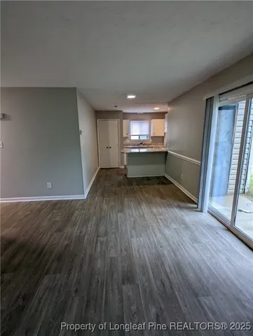a kitchen with a sink stove and refrigerator