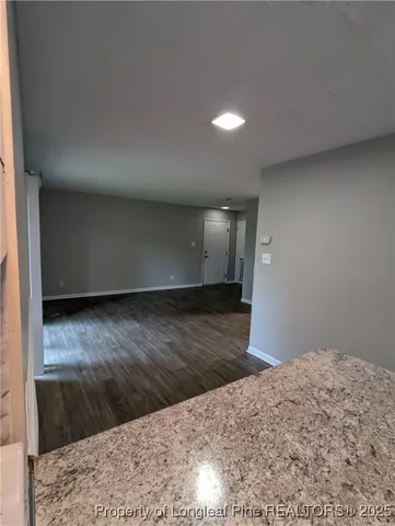 a view of a backyard of the house