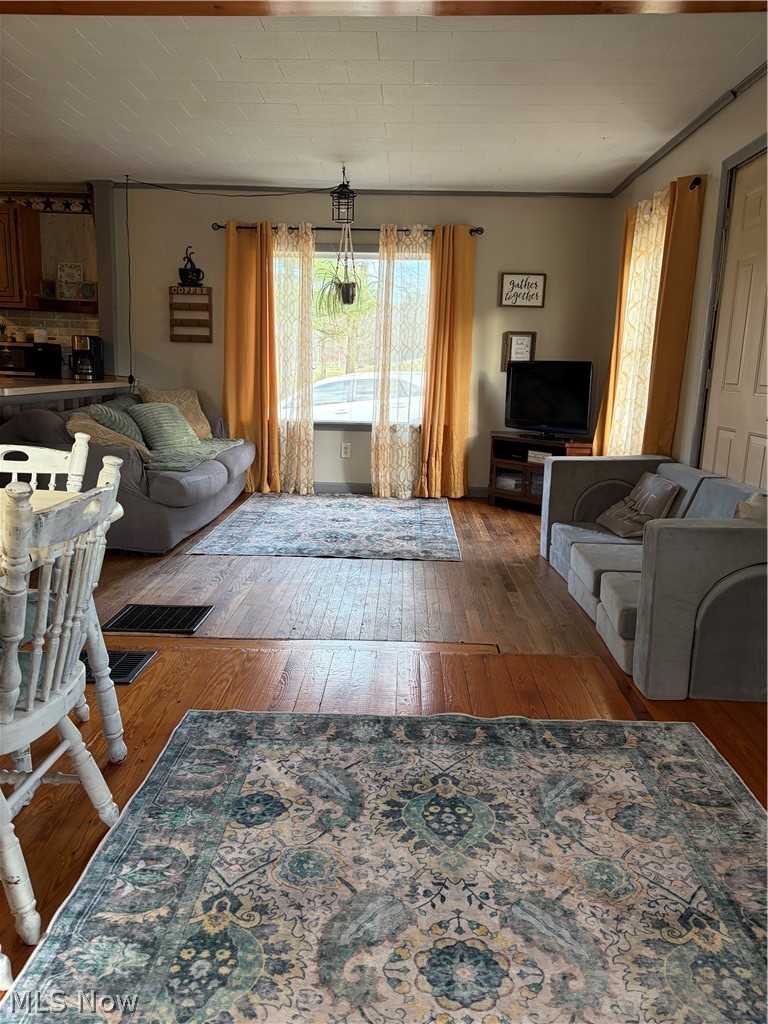 3719 Holmes Road Cambridge, OH 43725 - Photo 5 of 20 Living area with hardwood / wood-style flooring