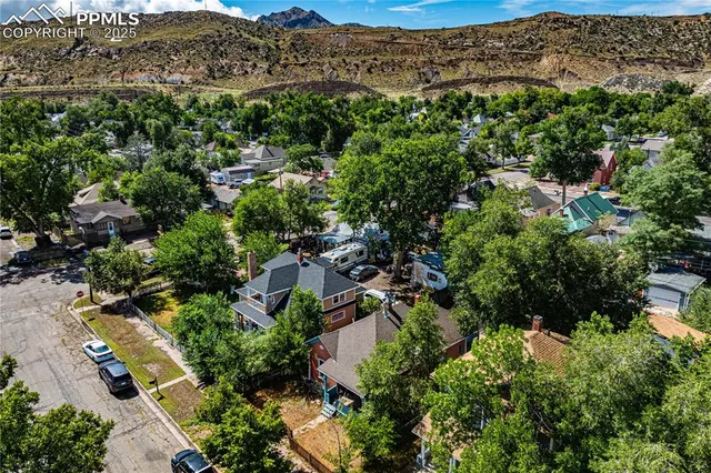an aerial view of residential house with outdoor space