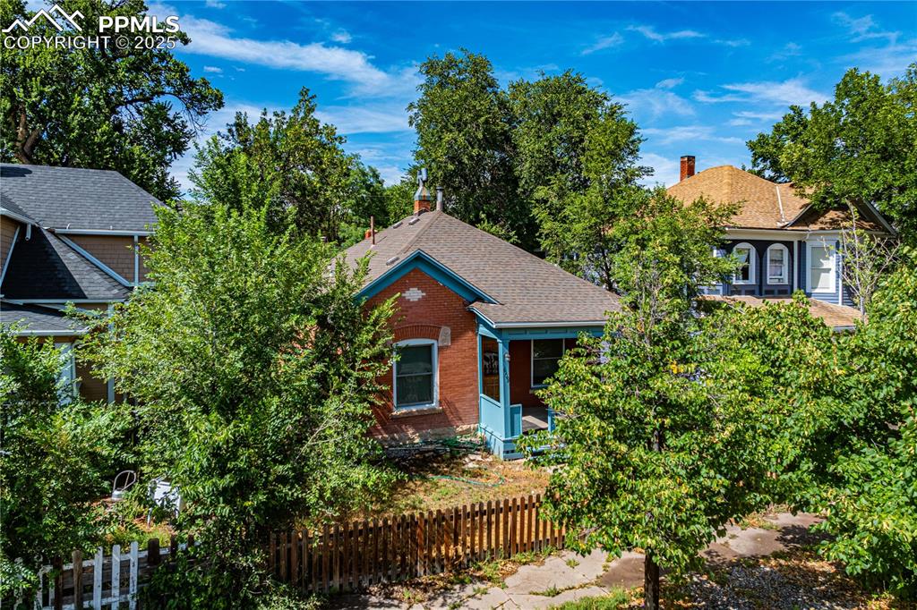 609 Rudd Avenue Canon City, CO 81212 - Photo 18 of 20 a front view of a house with a garden