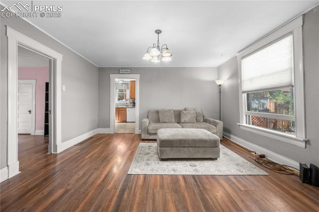 609 Rudd Avenue Canon City, CO 81212 - Photo 6 of 20 a living room with furniture and a window