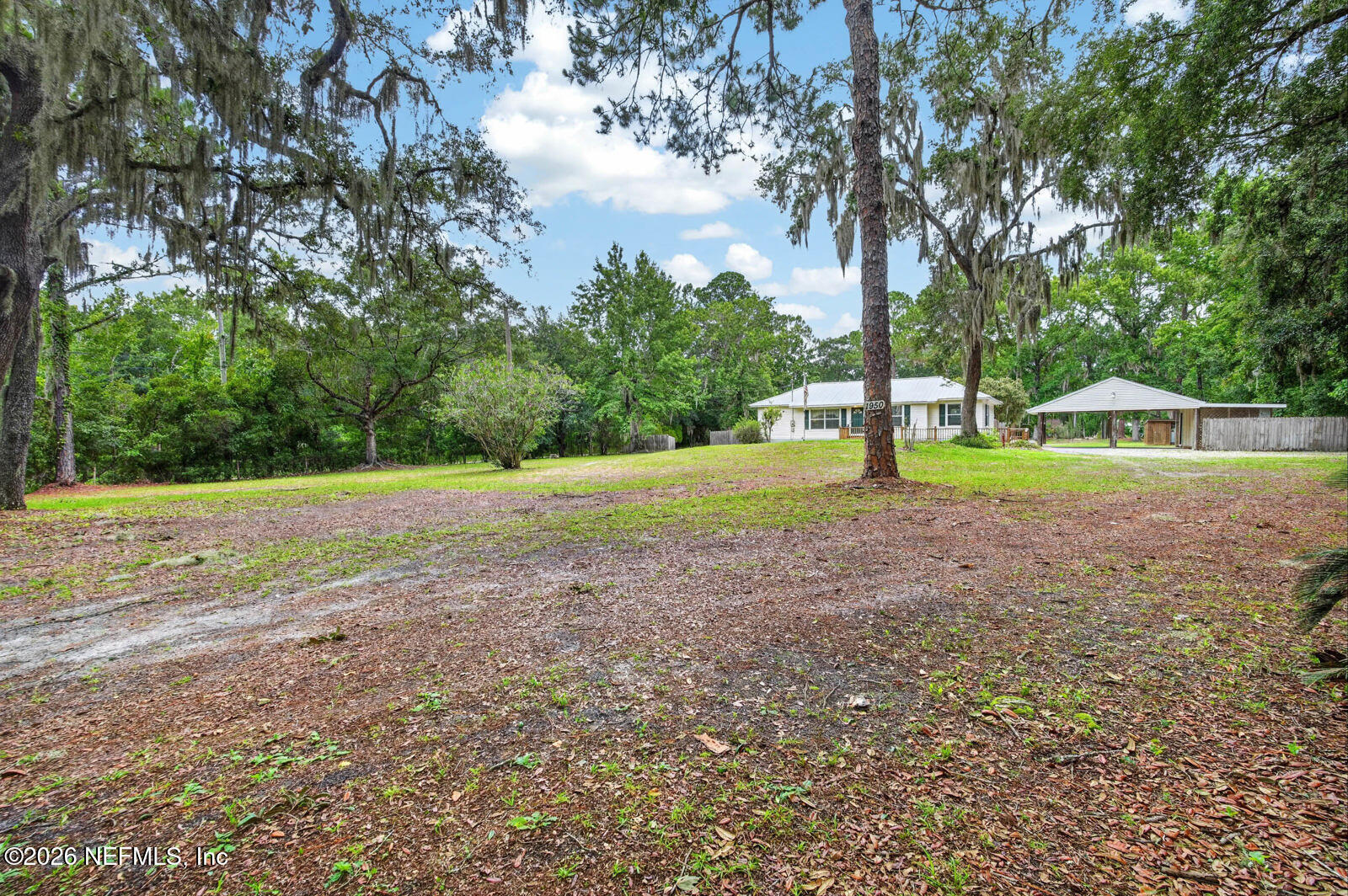 1950 Lightsey Road St. Augustine, FL 32084 - Photo 5 of 57 a view of outdoor space with trees