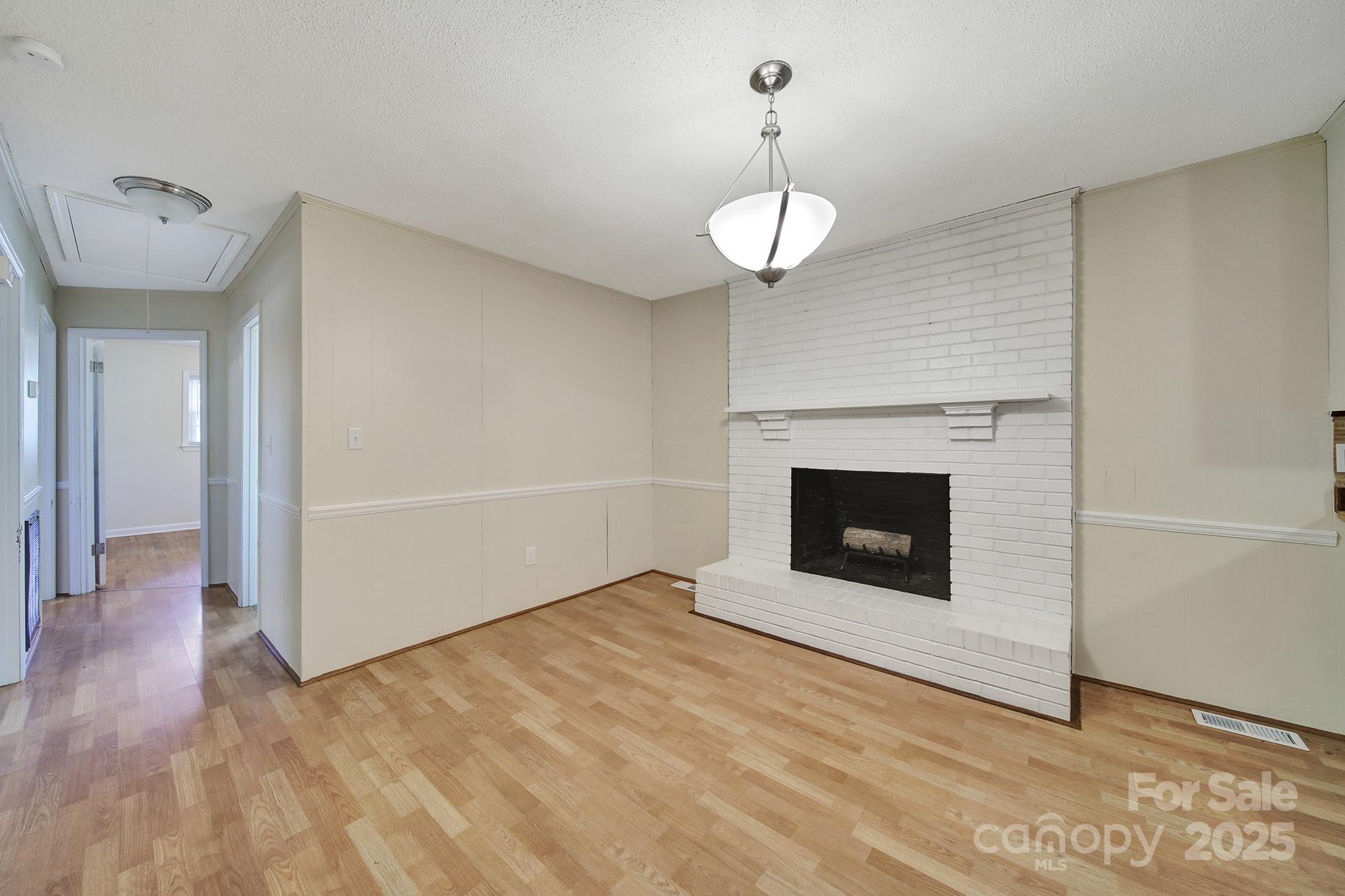 157 Holiday Road Lancaster, SC 29720 - Photo 15 of 31 a view of an empty room with a fireplace