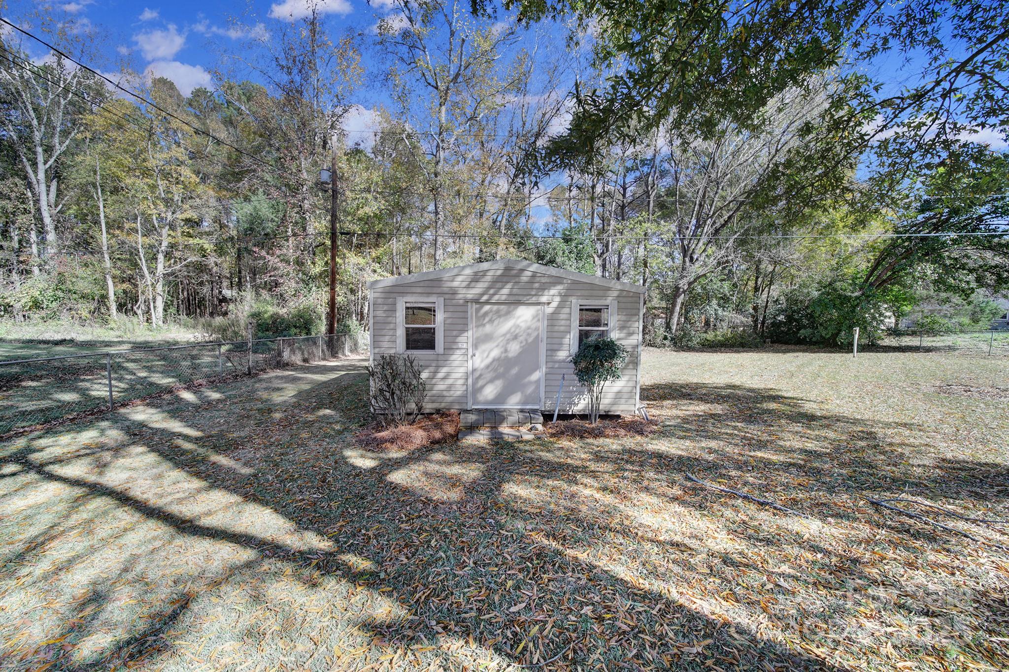 157 Holiday Road Lancaster, SC 29720 - Photo 30 of 31 a view of a house with a yard