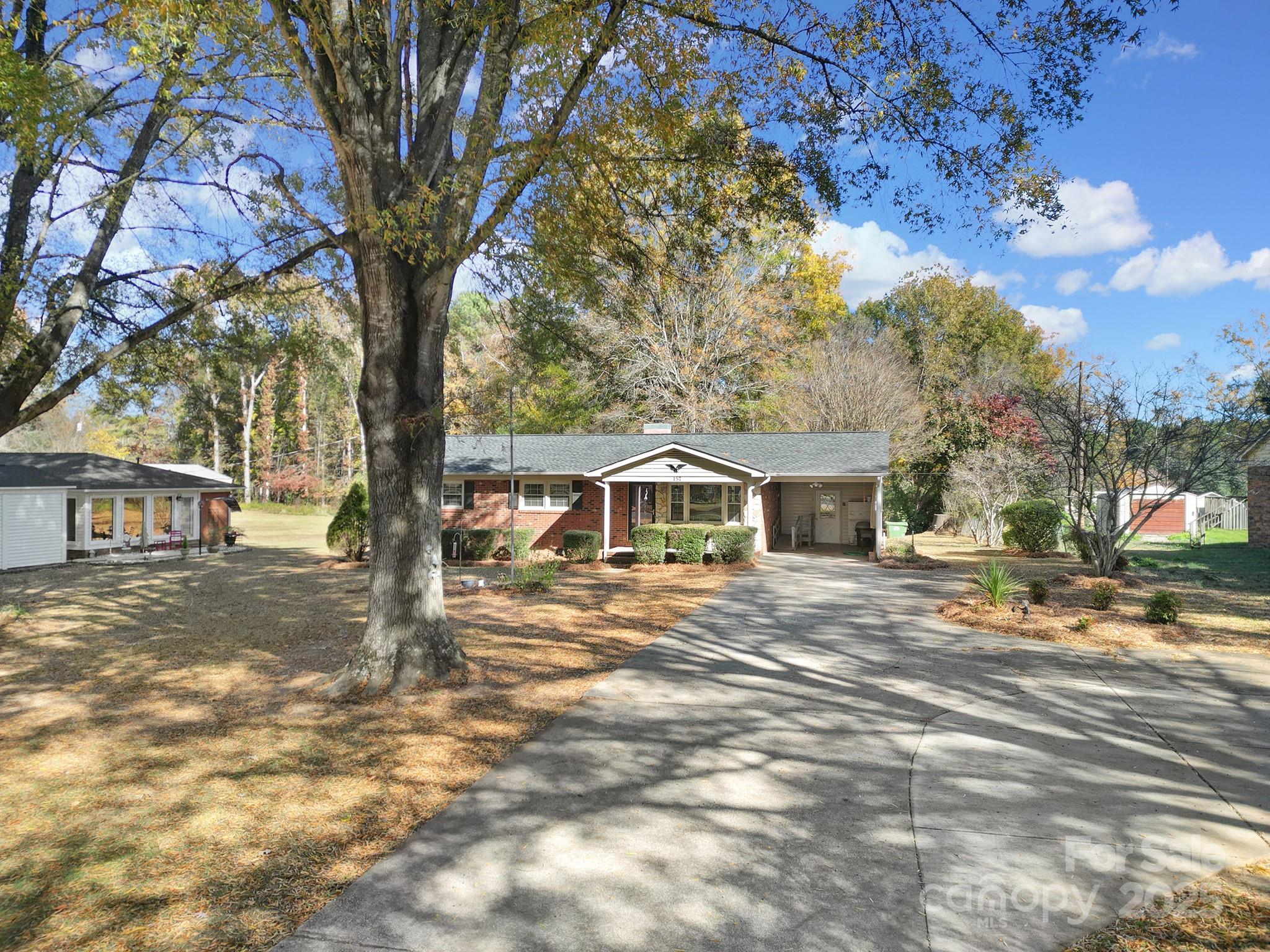 157 Holiday Road Lancaster, SC 29720 - Photo 5 of 31 a front view of a house with a yard