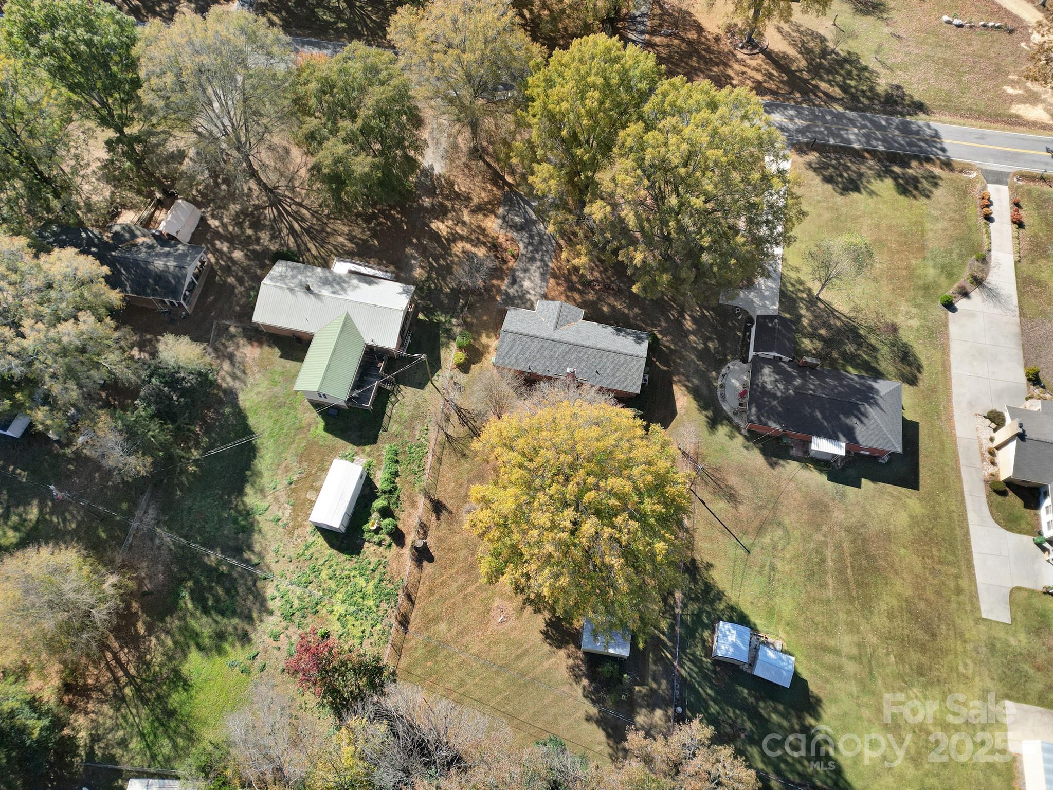 157 Holiday Road Lancaster, SC 29720 - Photo 7 of 31 an aerial view of a house with a yard and wooden fence