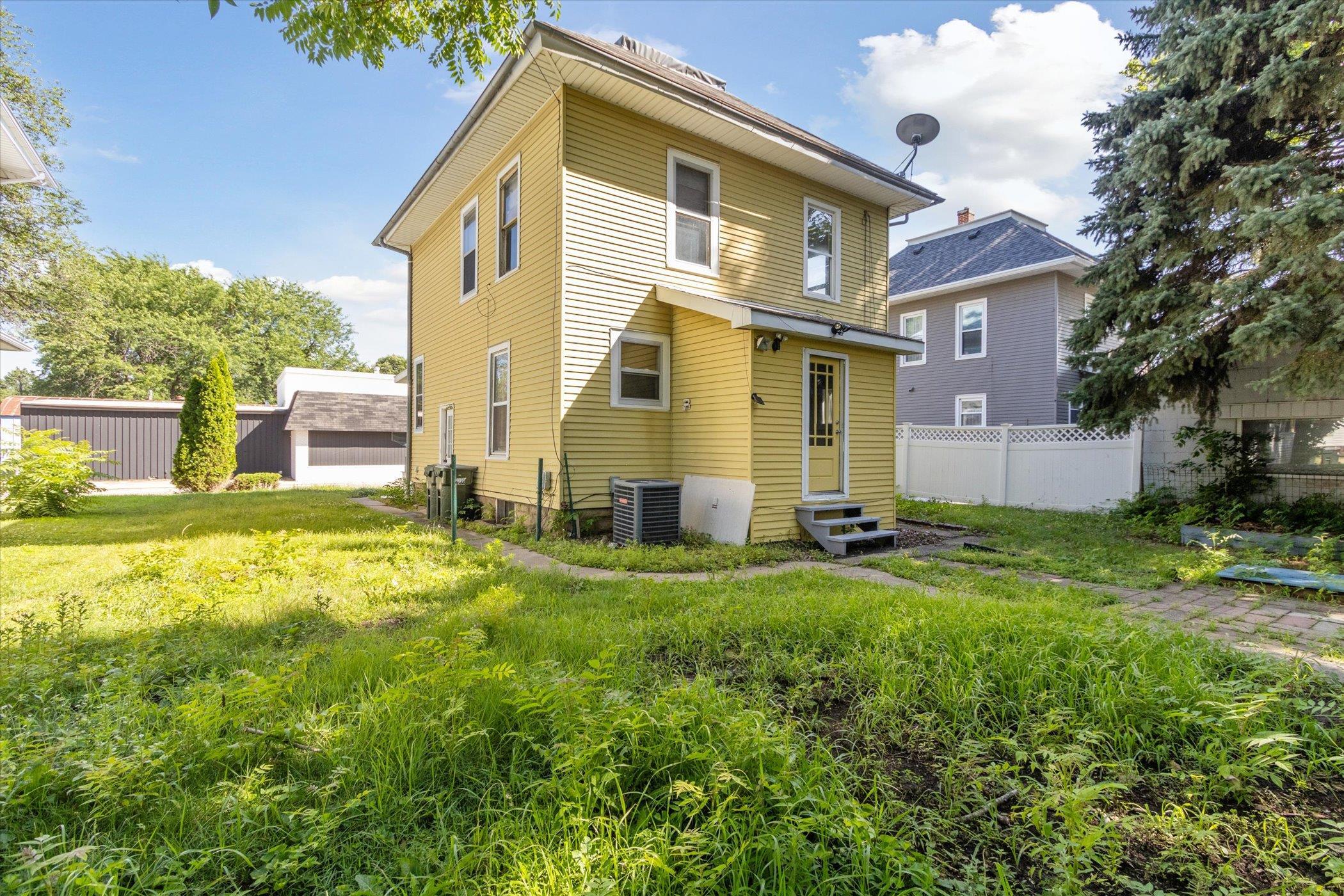1304 East 4th Street Sterling, IL 61081 - Photo 28 of 30 a view of a house with a yard