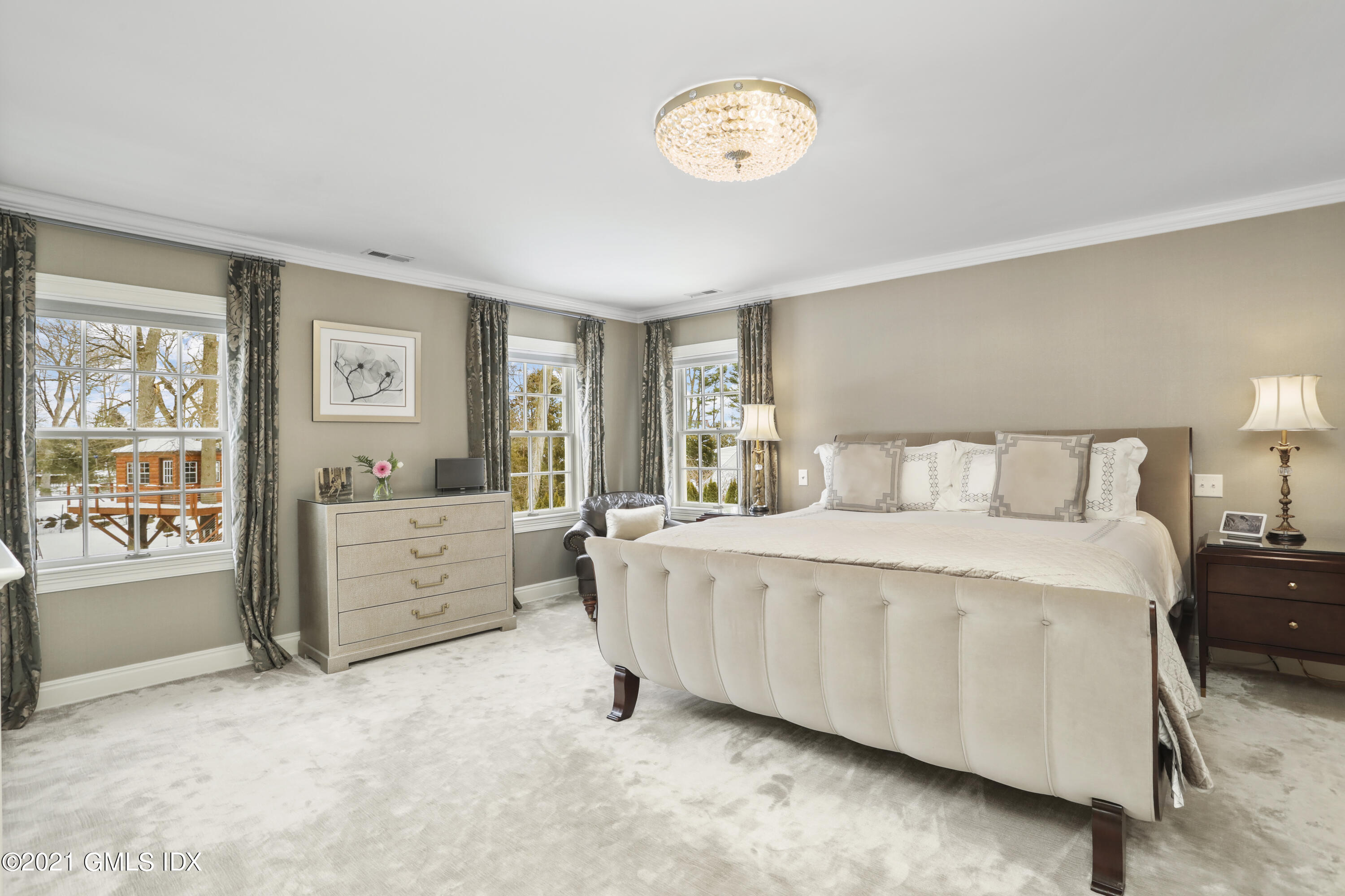 41 Dawn Harbor Lane Riverside, CT 06878 - Photo 14 of 33 a spacious bedroom with a bed and a cabinets