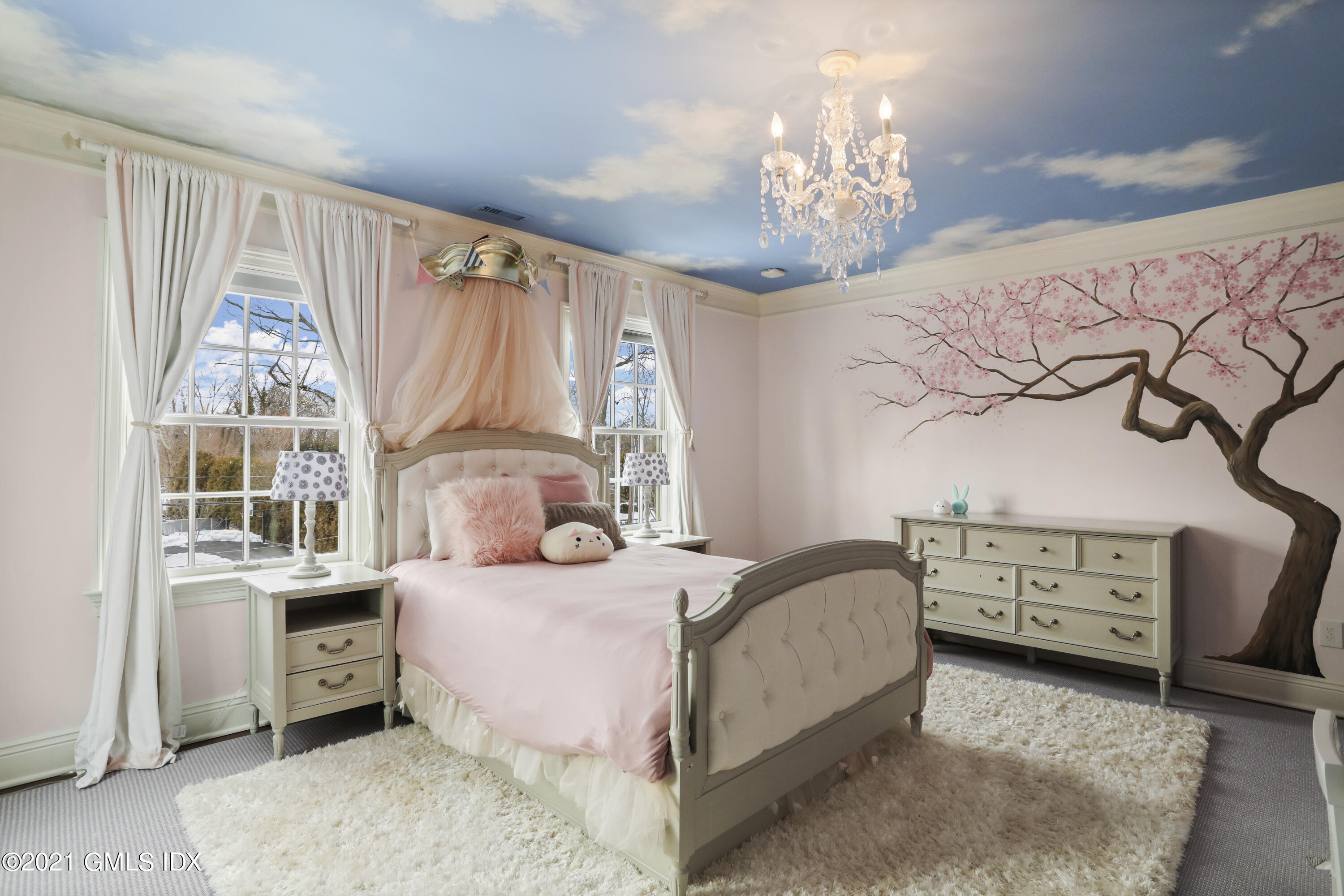 41 Dawn Harbor Lane Riverside, CT 06878 - Photo 17 of 33 a bedroom with a bed and a window