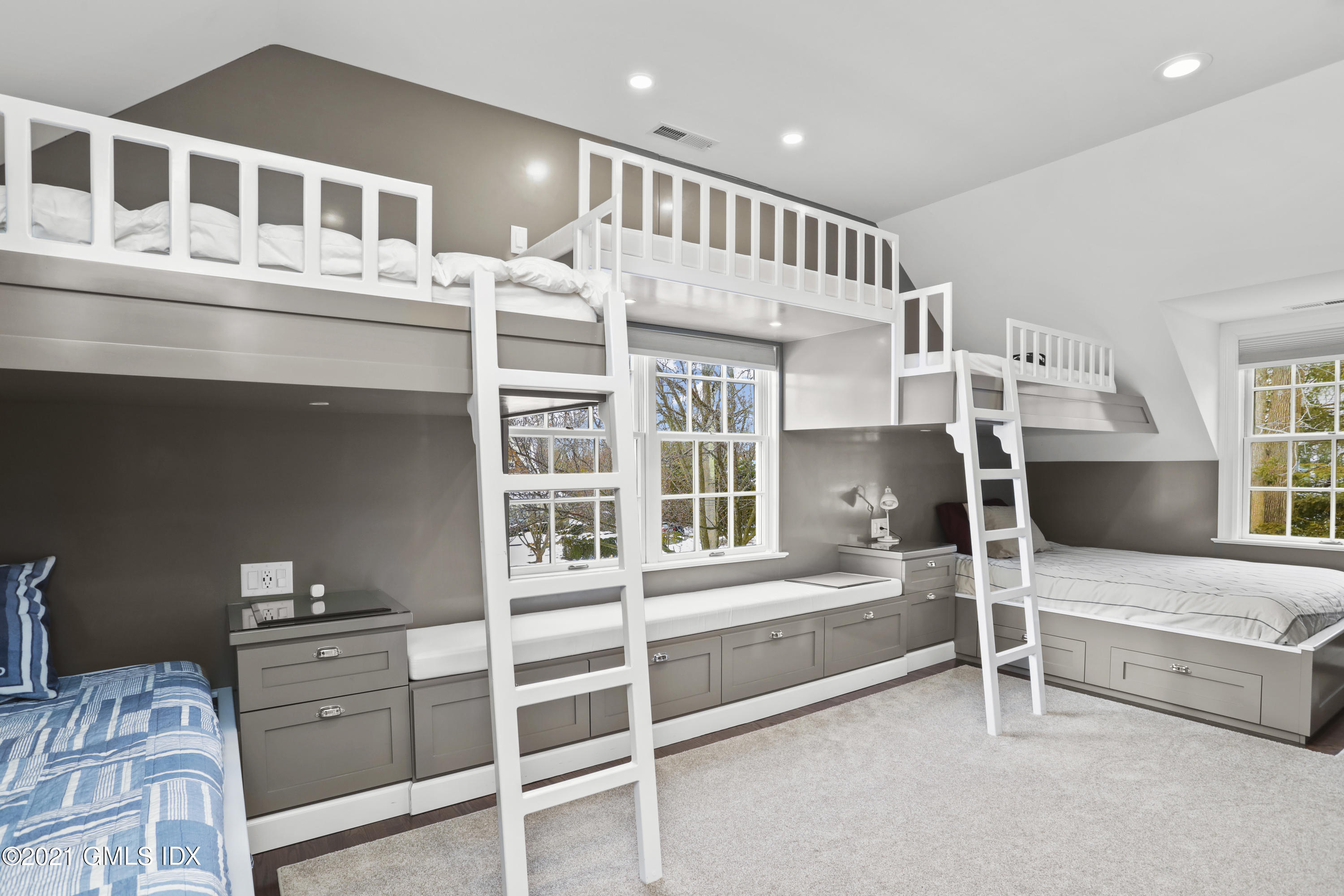 41 Dawn Harbor Lane Riverside, CT 06878 - Photo 21 of 33 a bedroom with furniture and a window