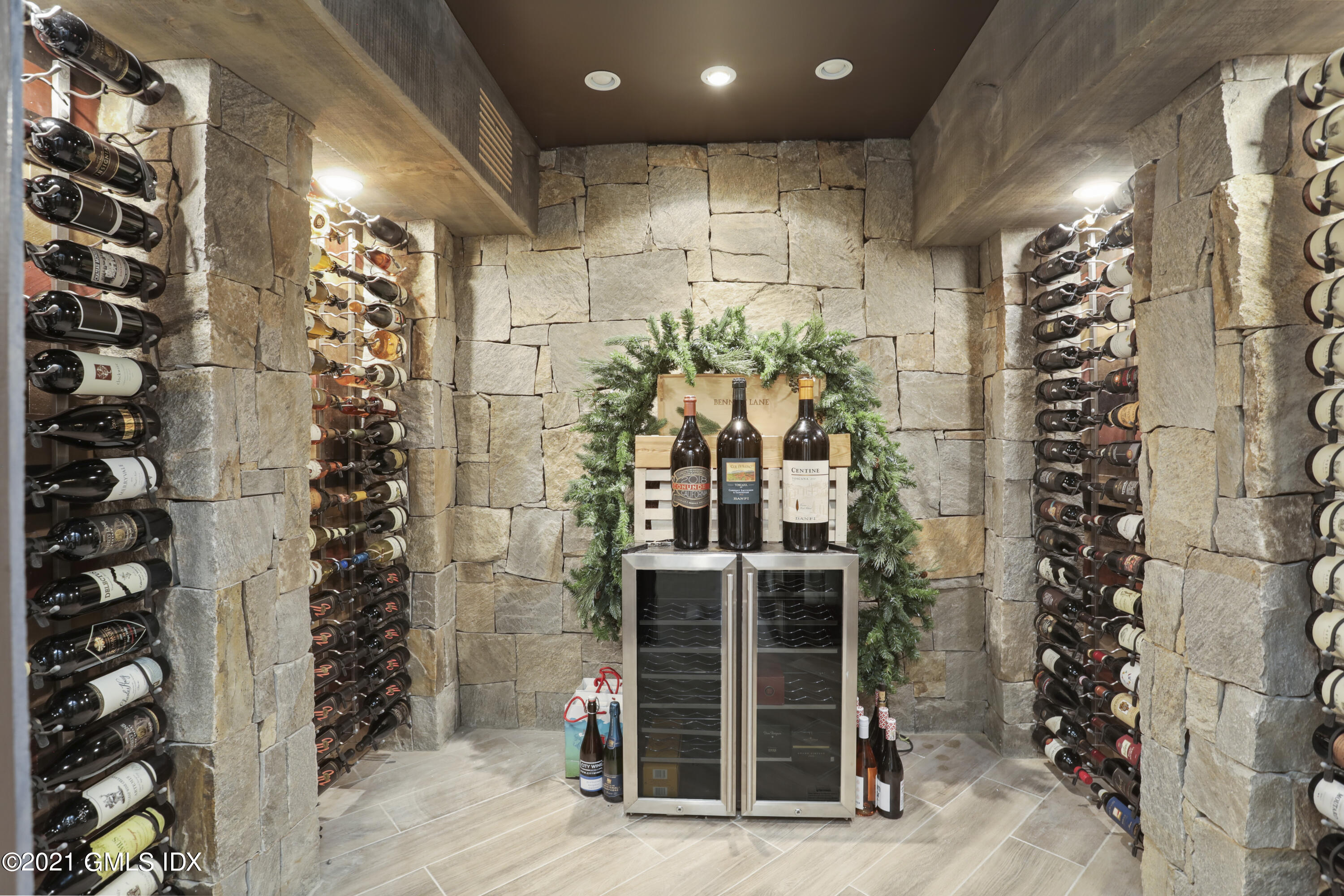 41 Dawn Harbor Lane Riverside, CT 06878 - Photo 26 of 33 a view of a entryway with a flower pot