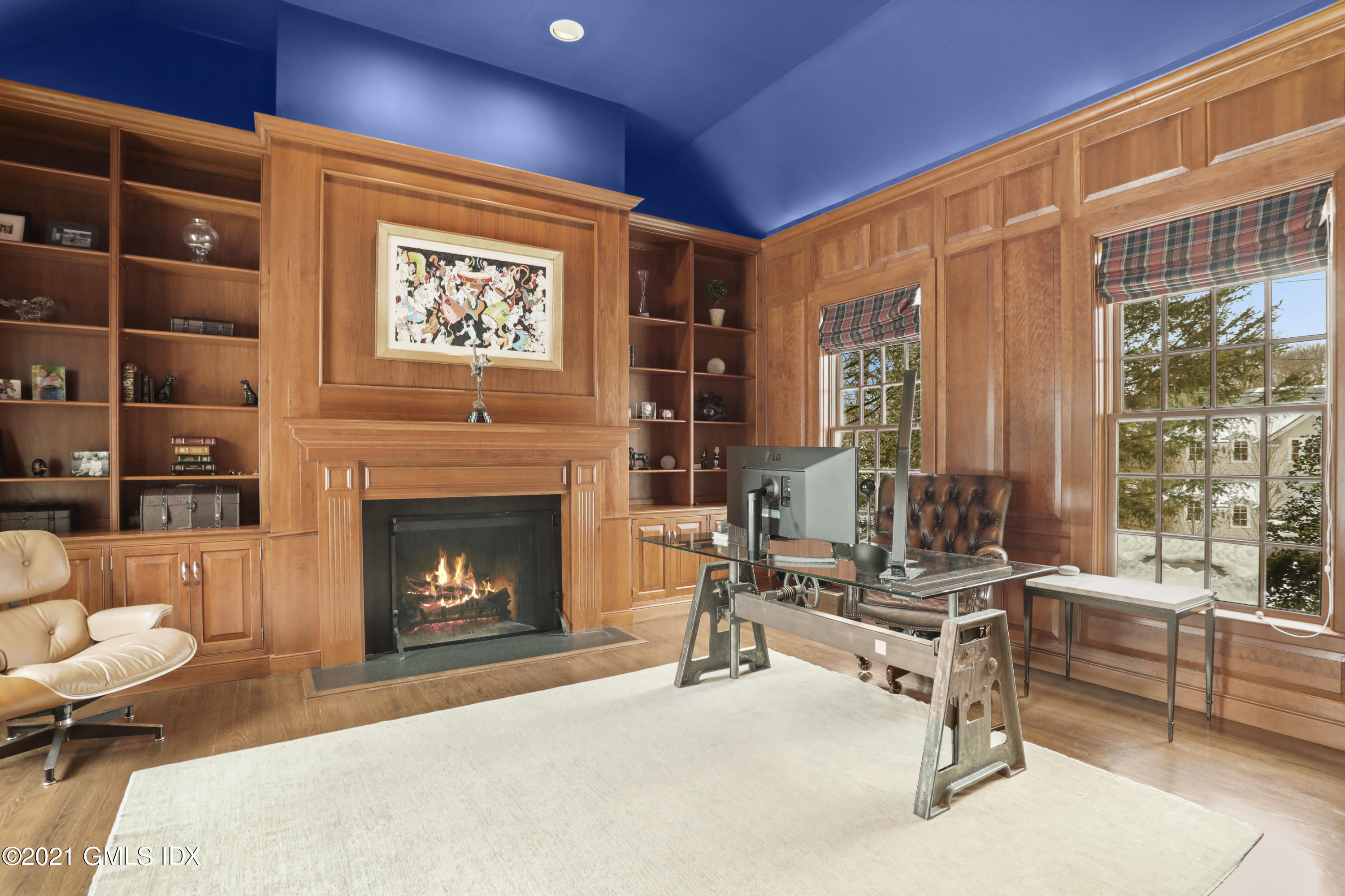 41 Dawn Harbor Lane Riverside, CT 06878 - Photo 9 of 33 a living room with furniture a window and a fireplace