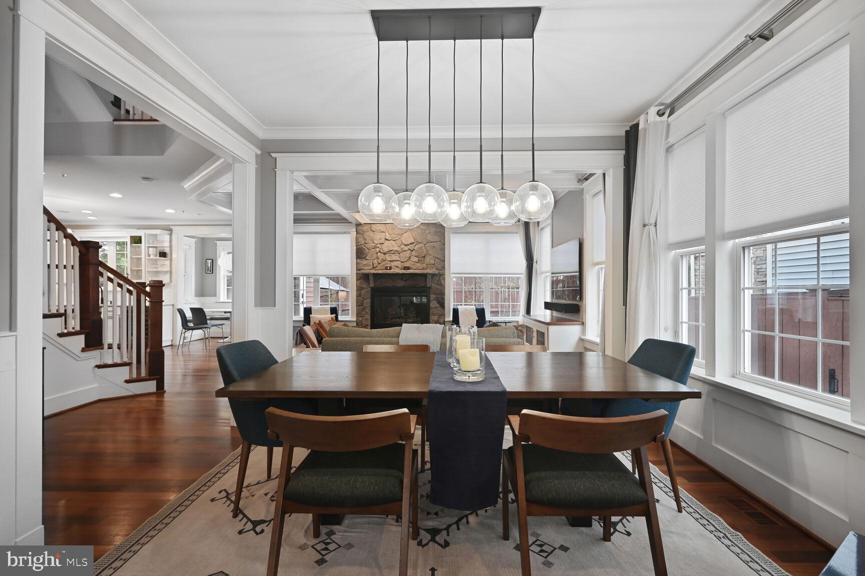 2107 Ellis Street Silver Spring, MD 20910 - Photo 13 of 63 a view of a dining room with furniture wooden floor and chandelier