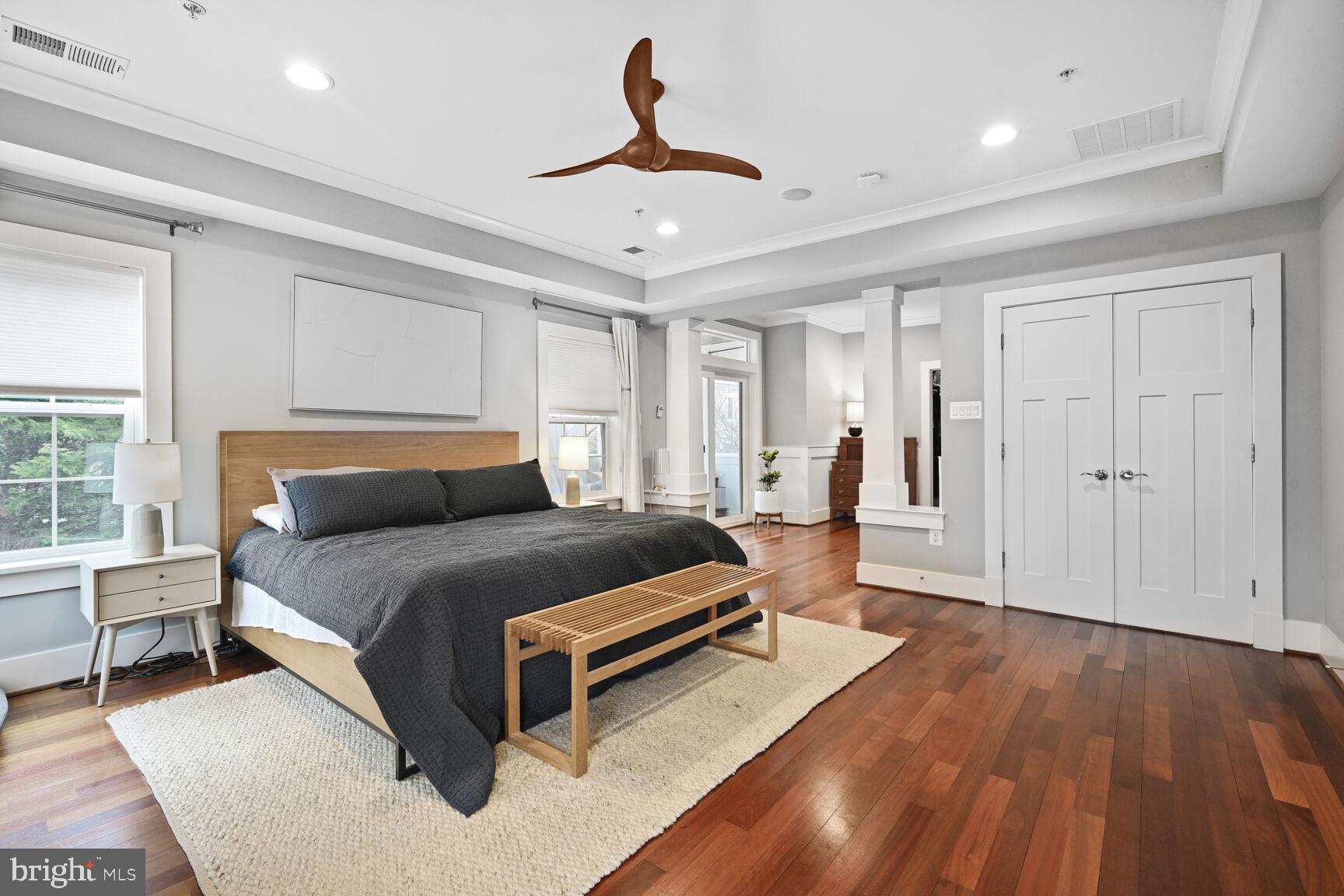 2107 Ellis Street Silver Spring, MD 20910 - Photo 34 of 63 a spacious bedroom with a bed and wooden floor