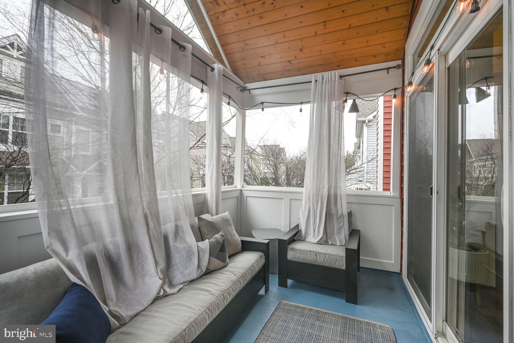 2107 Ellis Street Silver Spring, MD 20910 - Photo 42 of 63 a living room with furniture and a large window