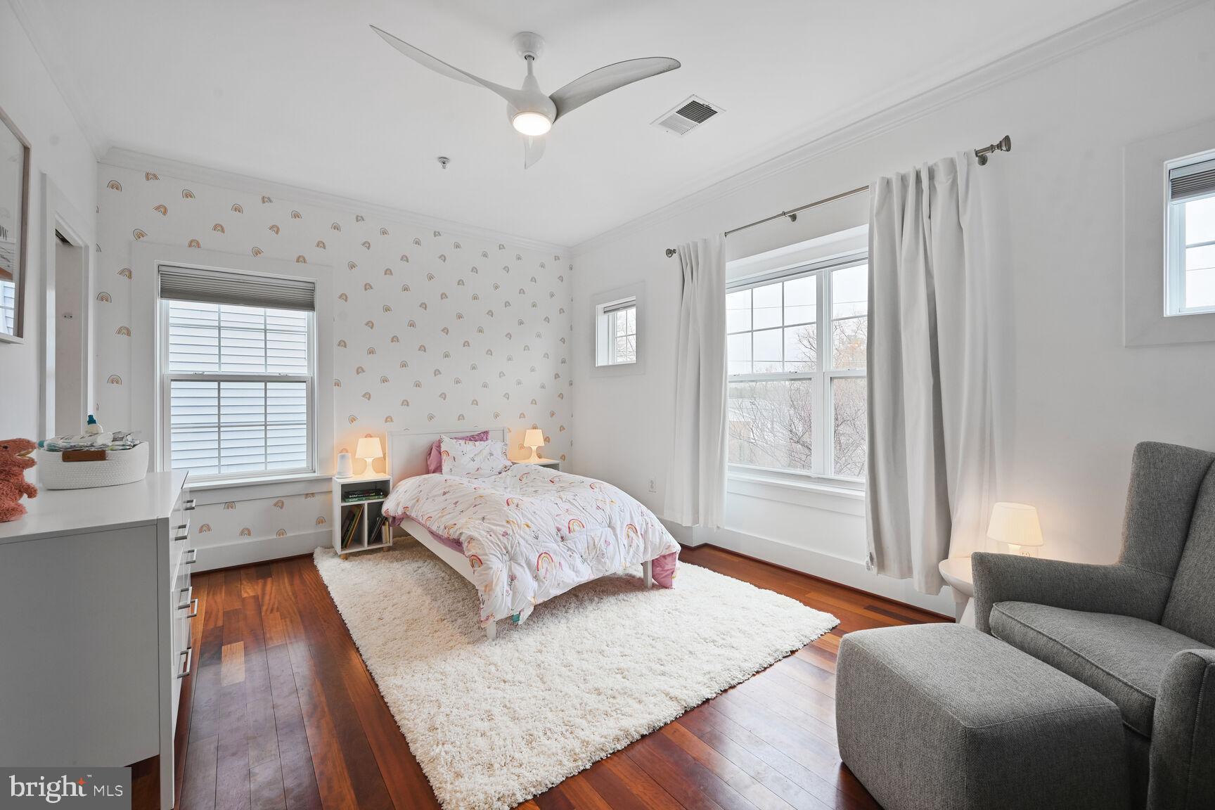 2107 Ellis Street Silver Spring, MD 20910 - Photo 47 of 63 a bedroom with a large bed and a couch