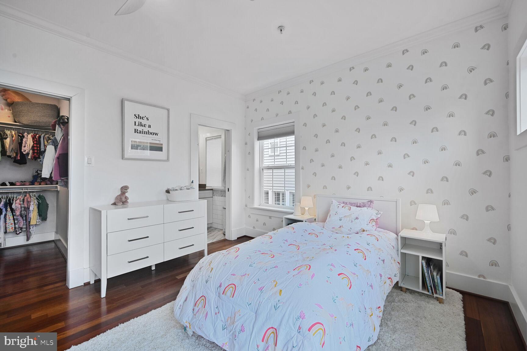 2107 Ellis Street Silver Spring, MD 20910 - Photo 48 of 63 a bedroom with a bed and a cabinets