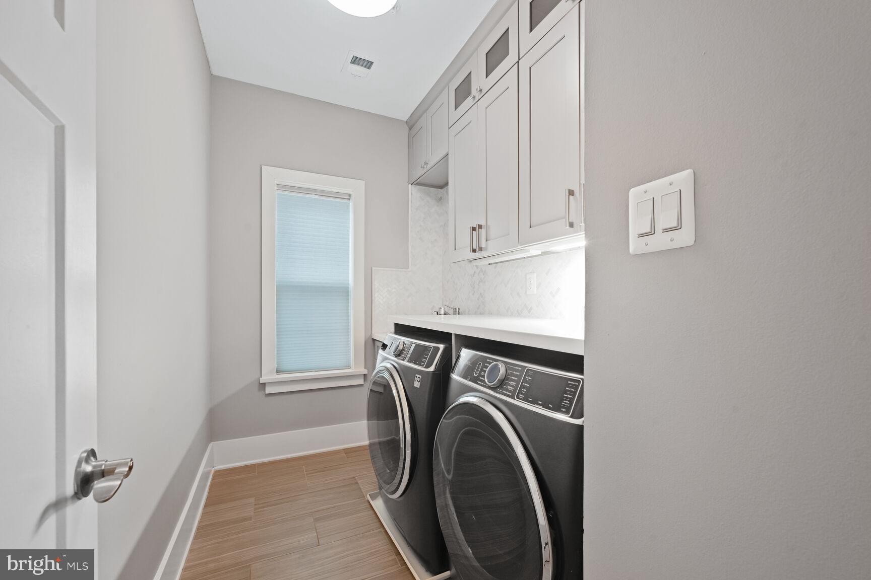 2107 Ellis Street Silver Spring, MD 20910 - Photo 51 of 63 a utility room with dryer and washer
