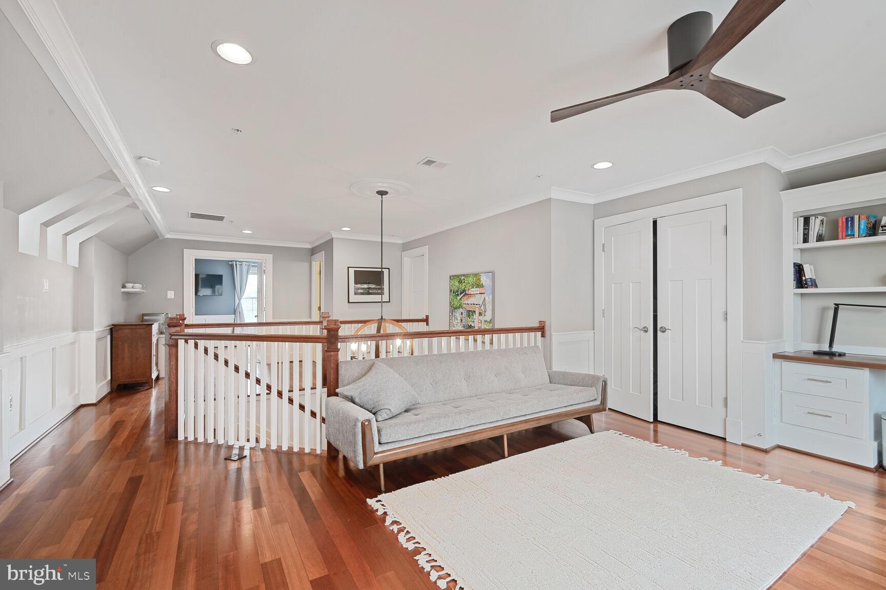 2107 Ellis Street Silver Spring, MD 20910 - Photo 52 of 63 a living room with furniture and a wooden floor