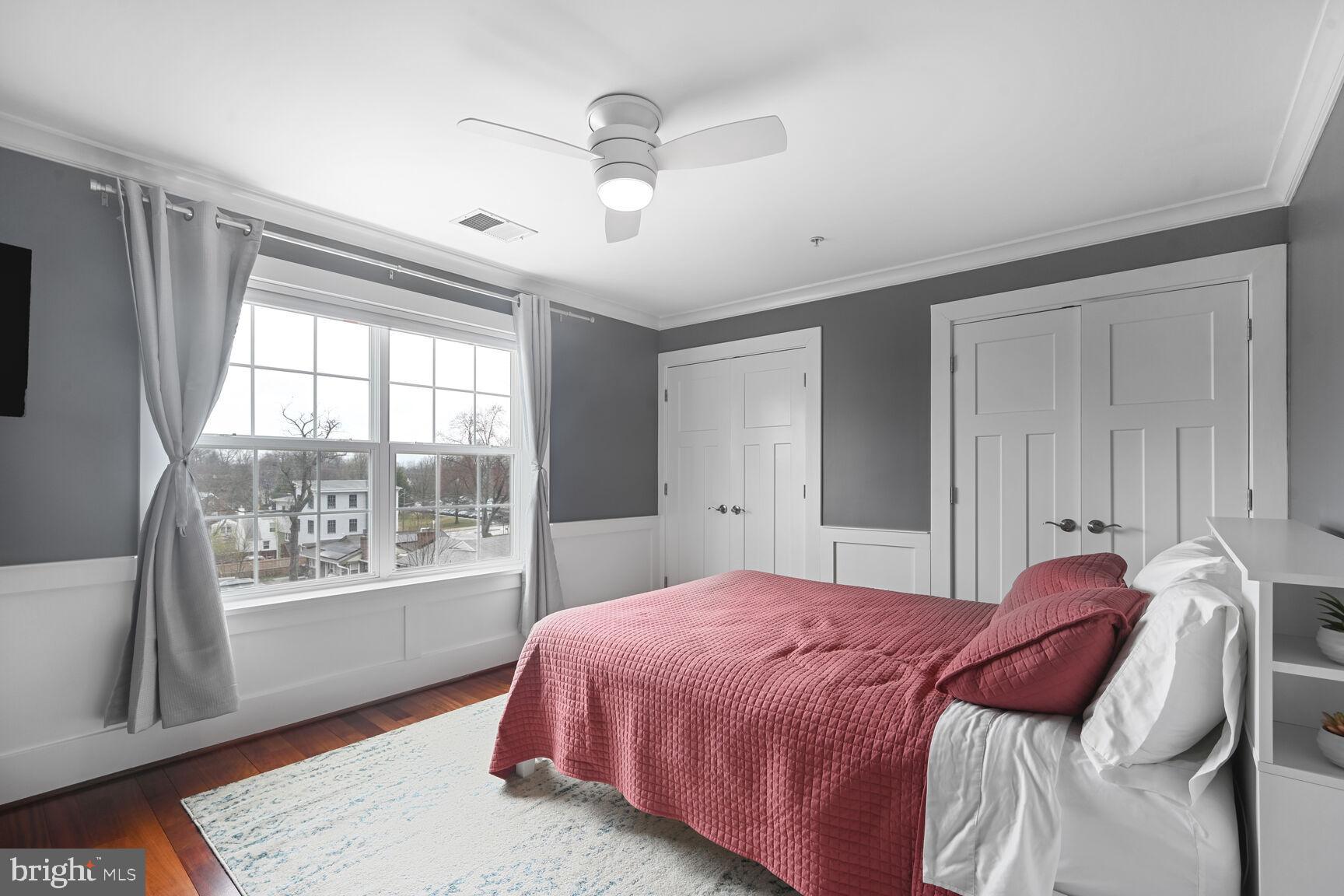 2107 Ellis Street Silver Spring, MD 20910 - Photo 54 of 63 a bedroom with a large bed and a window