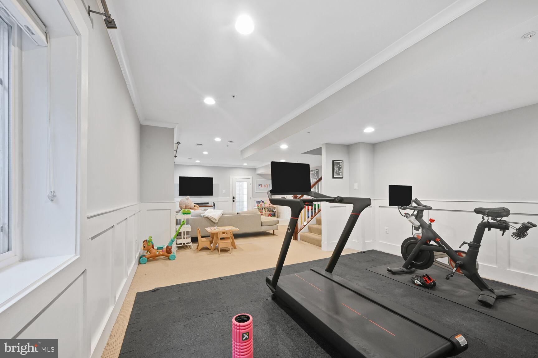 2107 Ellis Street Silver Spring, MD 20910 - Photo 62 of 63 a living room with furniture and a flat screen tv