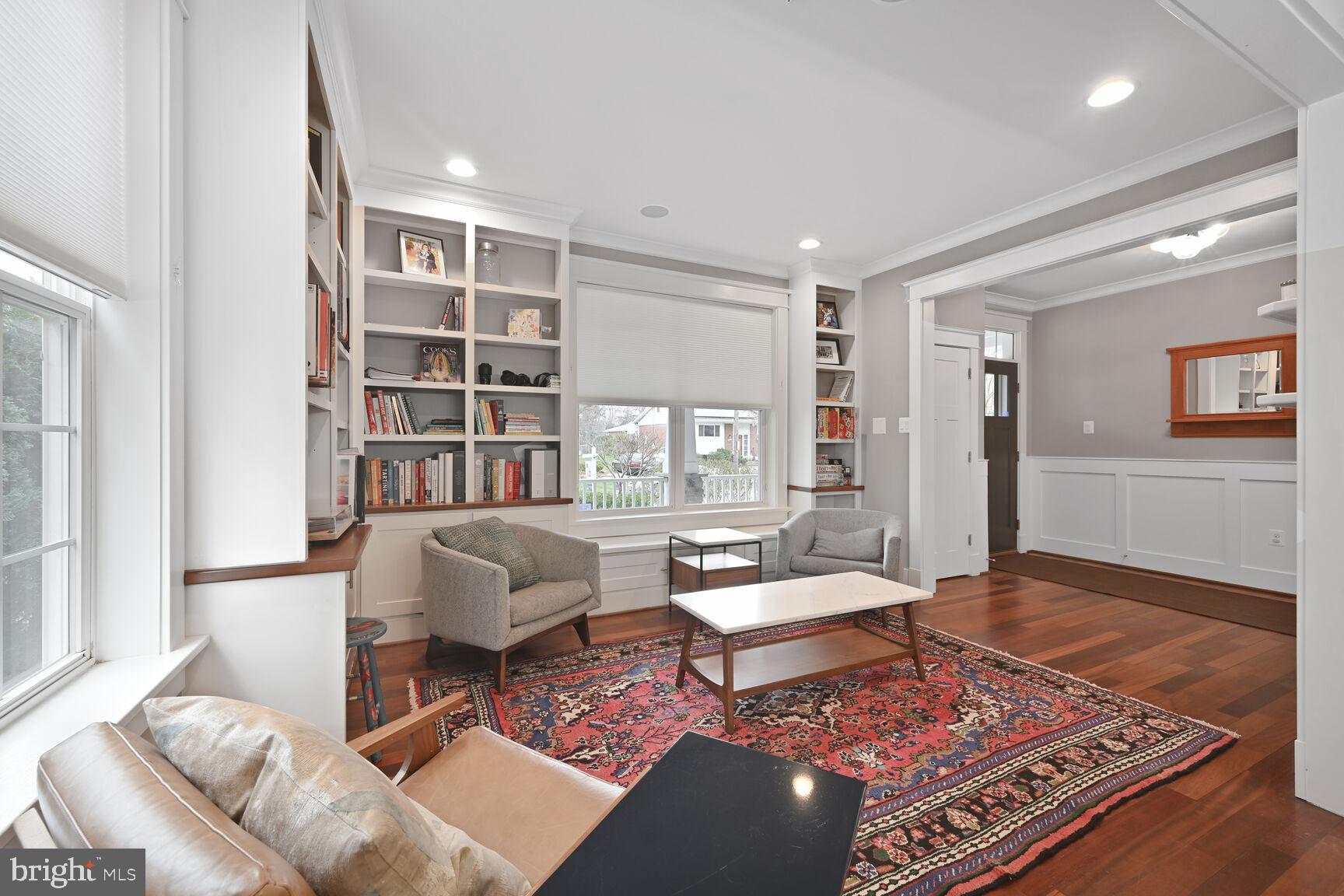 2107 Ellis Street Silver Spring, MD 20910 - Photo 9 of 63 a living room with furniture and a book shelf