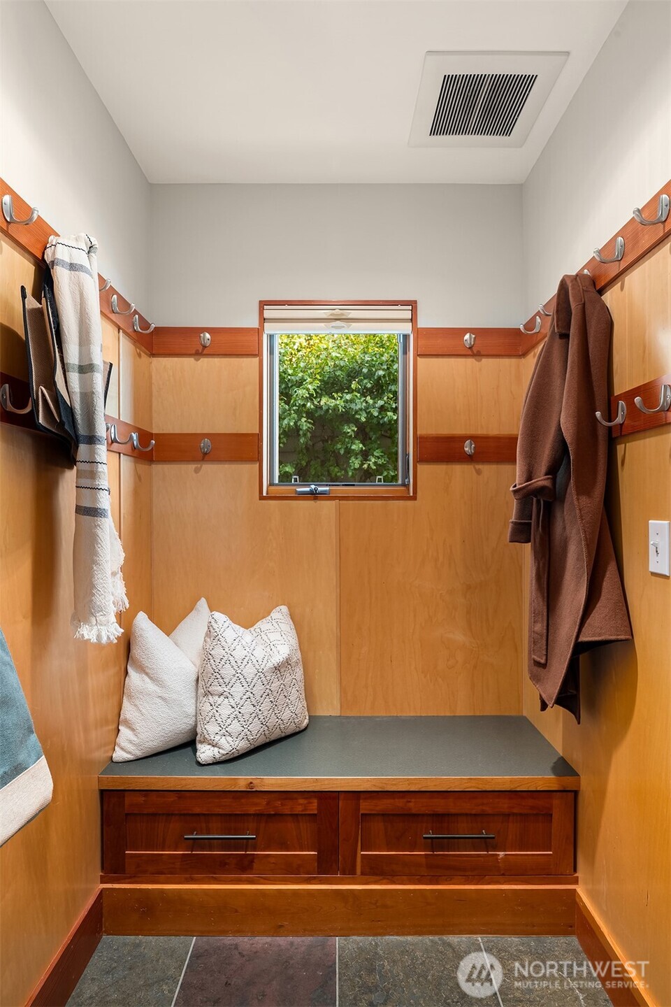 2252 Viewmont Way West Seattle, WA 98199 - Photo 13 of 40 a view of walk in closet with clothes and shoes