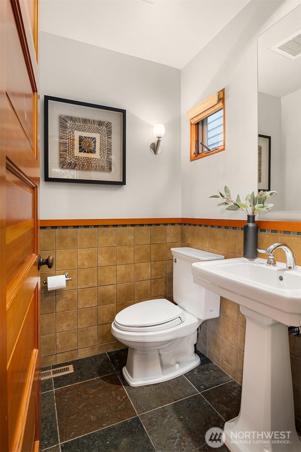2252 Viewmont Way West Seattle, WA 98199 - Photo 14 of 40 a bathroom with a toilet a sink and a shower