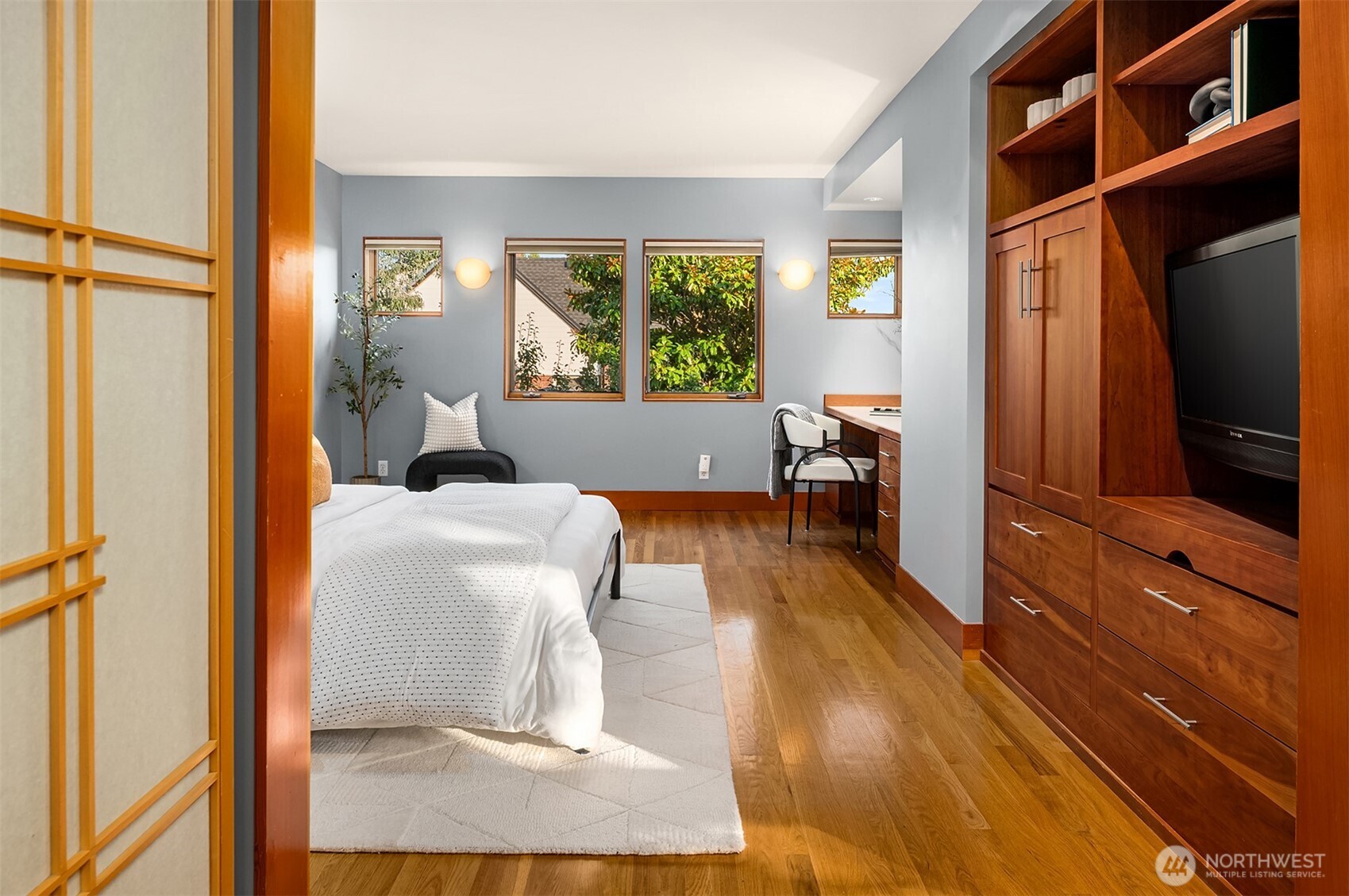 2252 Viewmont Way West Seattle, WA 98199 - Photo 20 of 40 a living room with a large window wooden floor and furniture