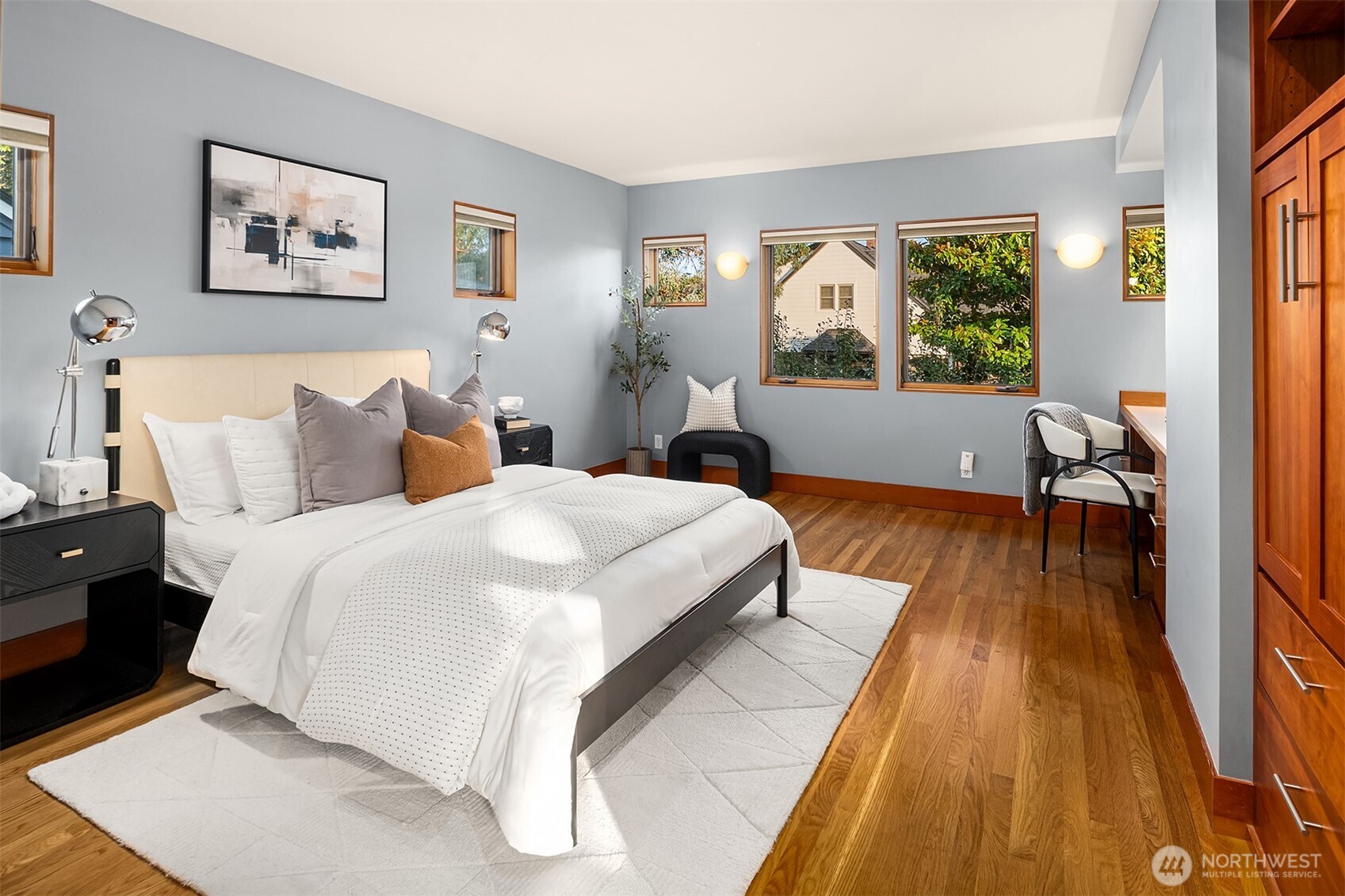 2252 Viewmont Way West Seattle, WA 98199 - Photo 21 of 40 a spacious bedroom with a bed and a large window