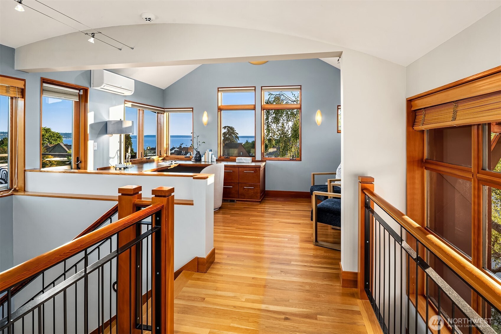 2252 Viewmont Way West Seattle, WA 98199 - Photo 25 of 40 a view of a living room with furniture and wooden floor