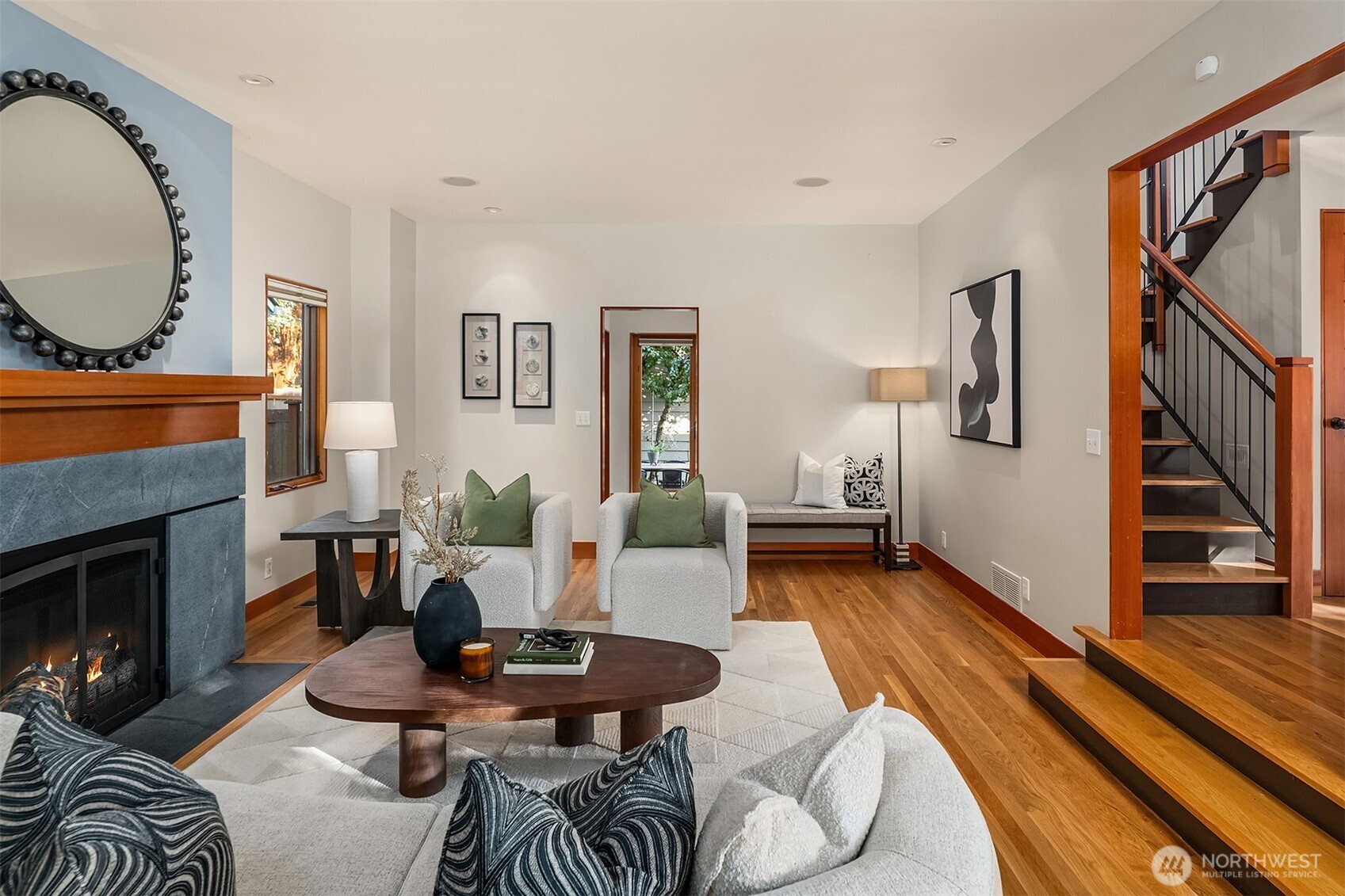 2252 Viewmont Way West Seattle, WA 98199 - Photo 3 of 40 a living room with furniture and a fireplace