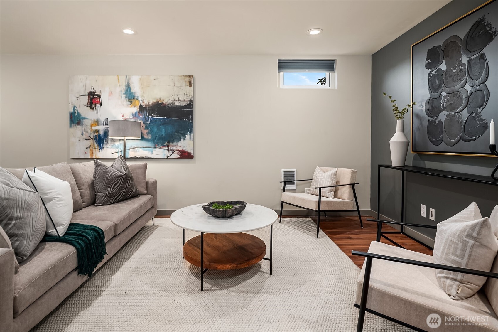 2252 Viewmont Way West Seattle, WA 98199 - Photo 33 of 40 a living room with furniture and a flat screen tv